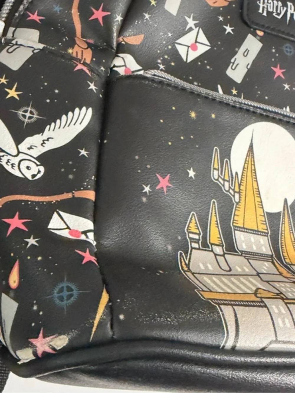 Warner Bros. Harry Potter Black Mini Backpack with Gold & White Accents